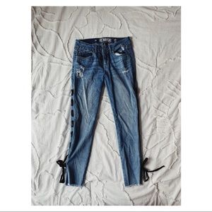 denim jeans with black ribbon detail